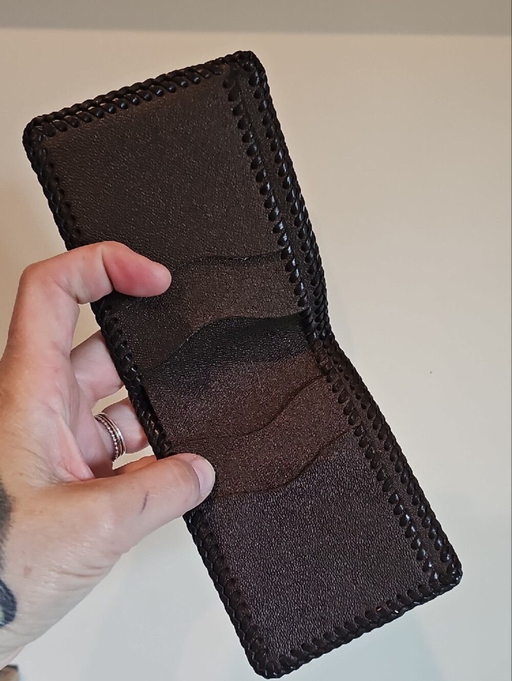Hand-Tooled Leather Bifold Wallet in Tan with Black Trim - Picture 3 of 8